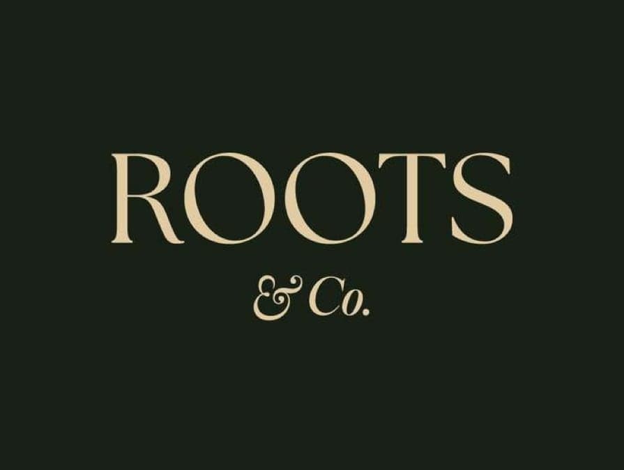 Roots & Co. logo on forest green