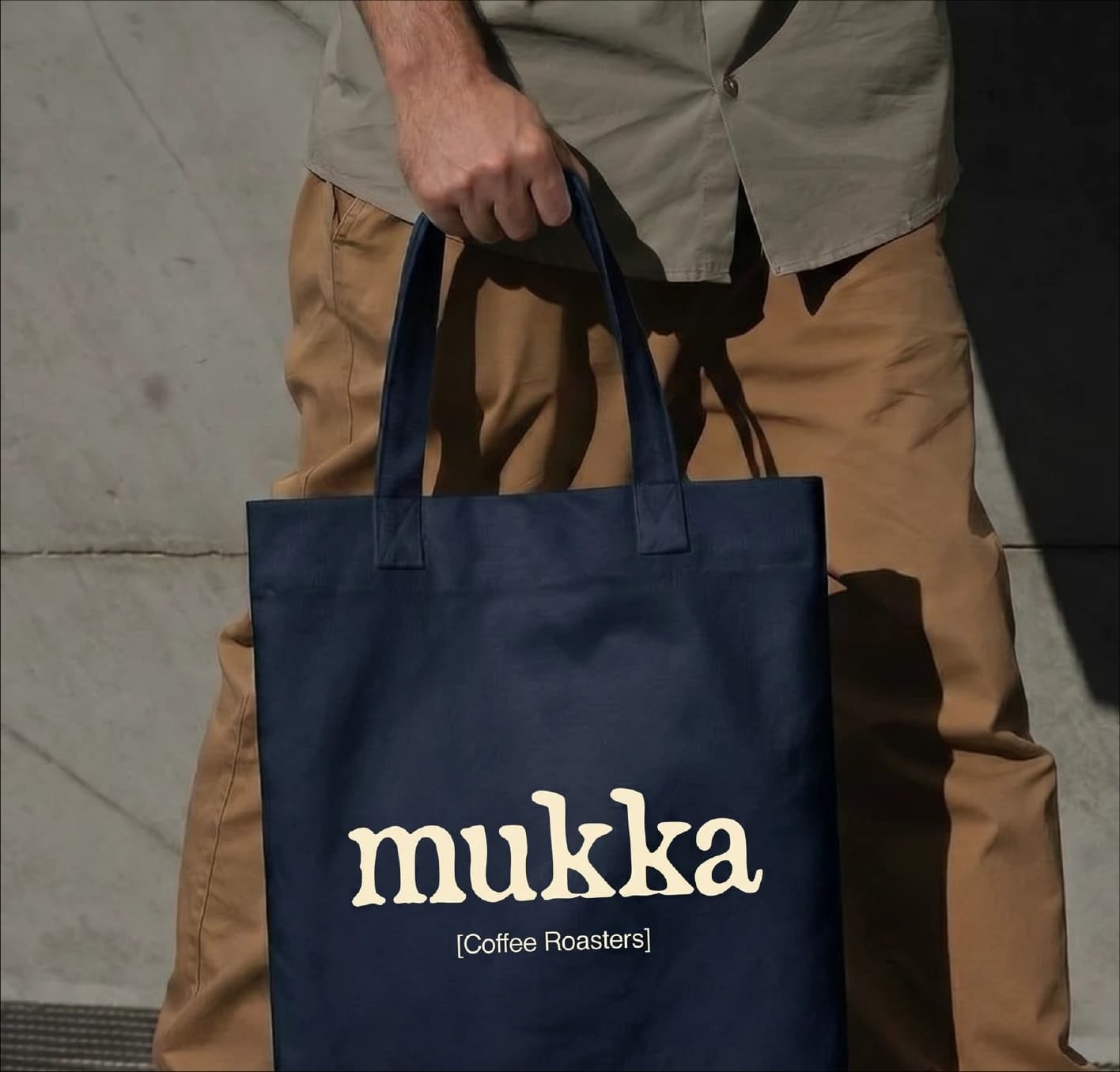 A navy Mukka tote bag